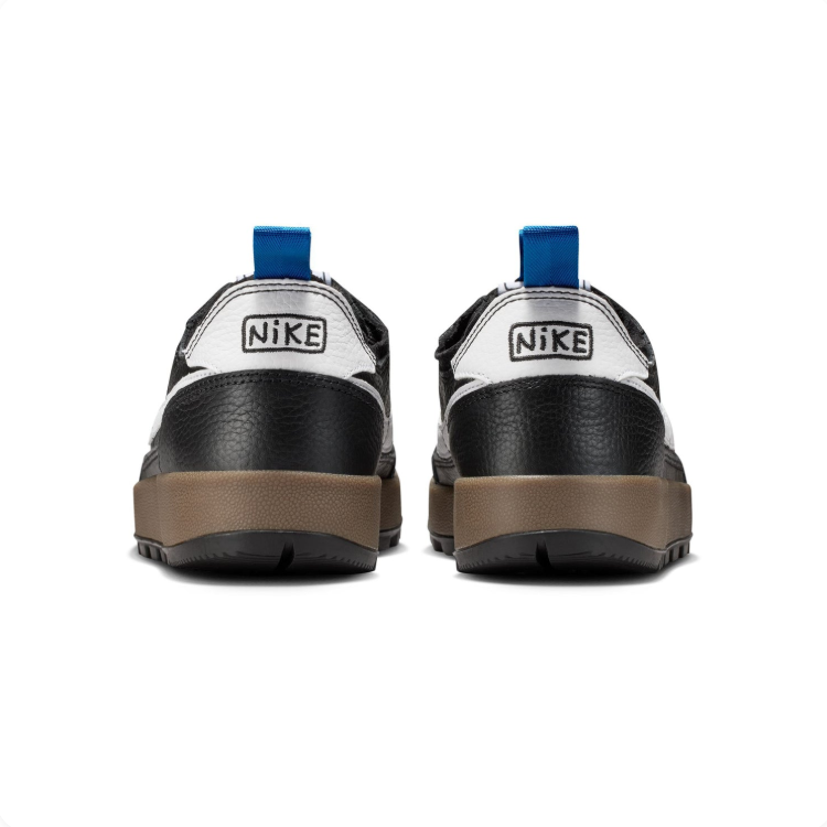 Nike Black and White Gum-Sole Sneakers with Blue Pull Tabs
