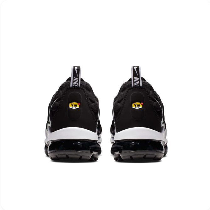 Nike Black & White Low-Top Sneakers | Wave Overlays & Segmented Air Sole