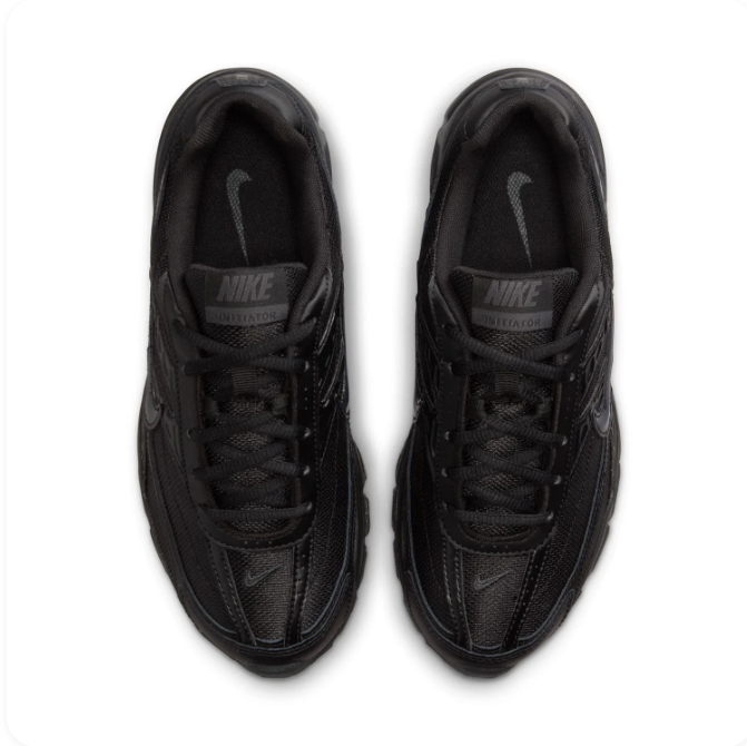 Nike All-Black Low-Top Sneakers | Layered Upper & Chunky Sculpted Sole