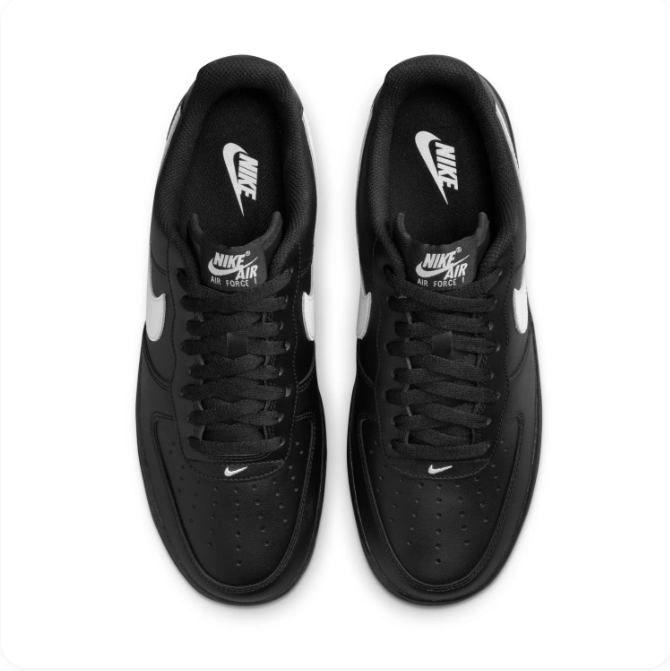 Nike Black Low-Top Sneakers | White Swoosh & Black Sole