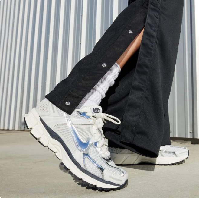 Nike White & Silver Low-Top Sneakers | Ribbed Side Panels & Cream Midsole
