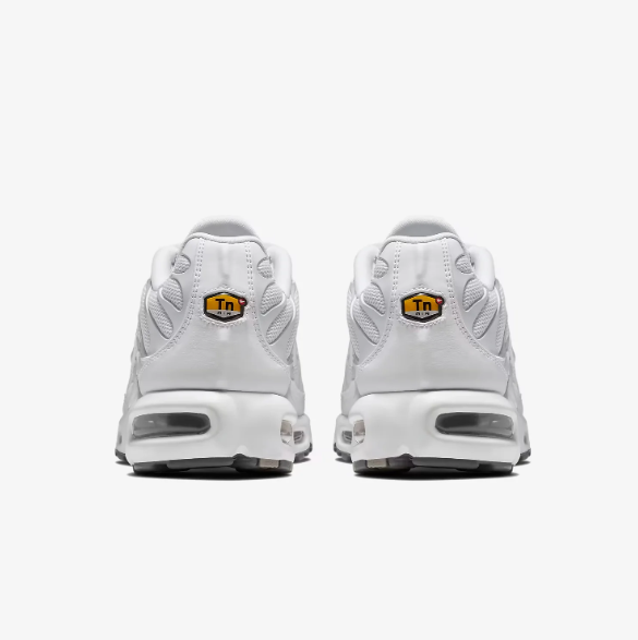 Nike White Low-Top Sneakers | Curved Overlays & Visible Sole Windows